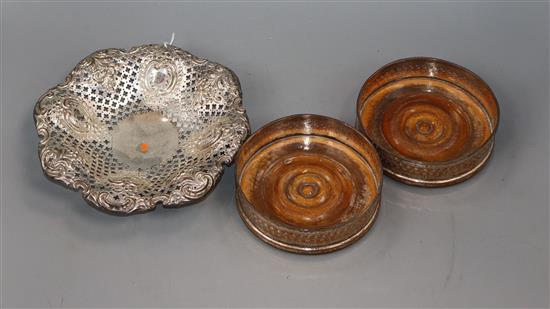 A late Victorian pierced silver dish, Sheffield, 1896 and a pair of Sheffield plate wine coasters.